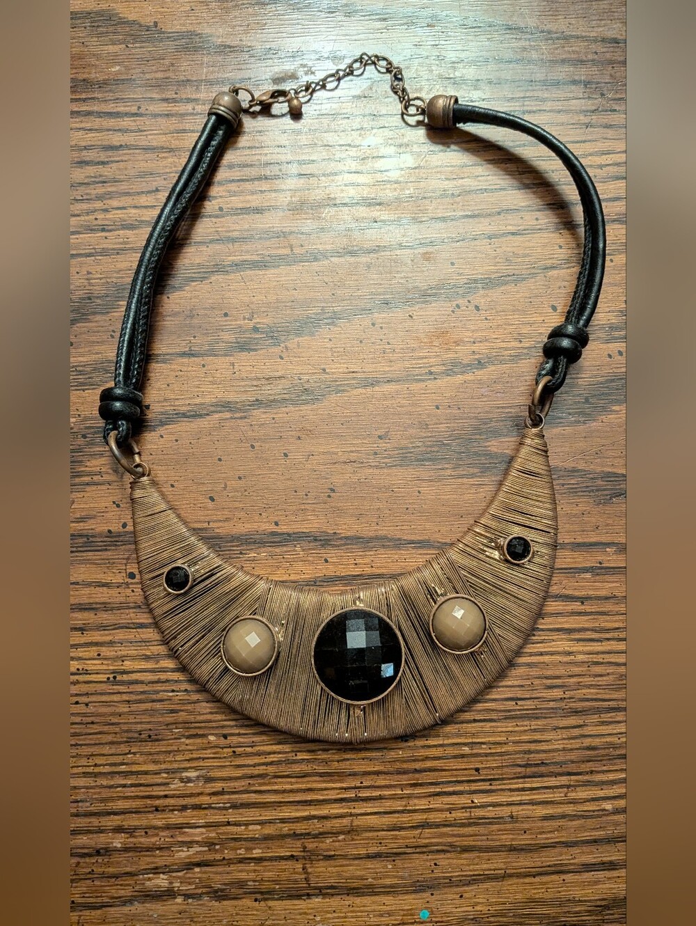 Statement Bronze-Tone Crescent Necklace with Black and Beige Stones